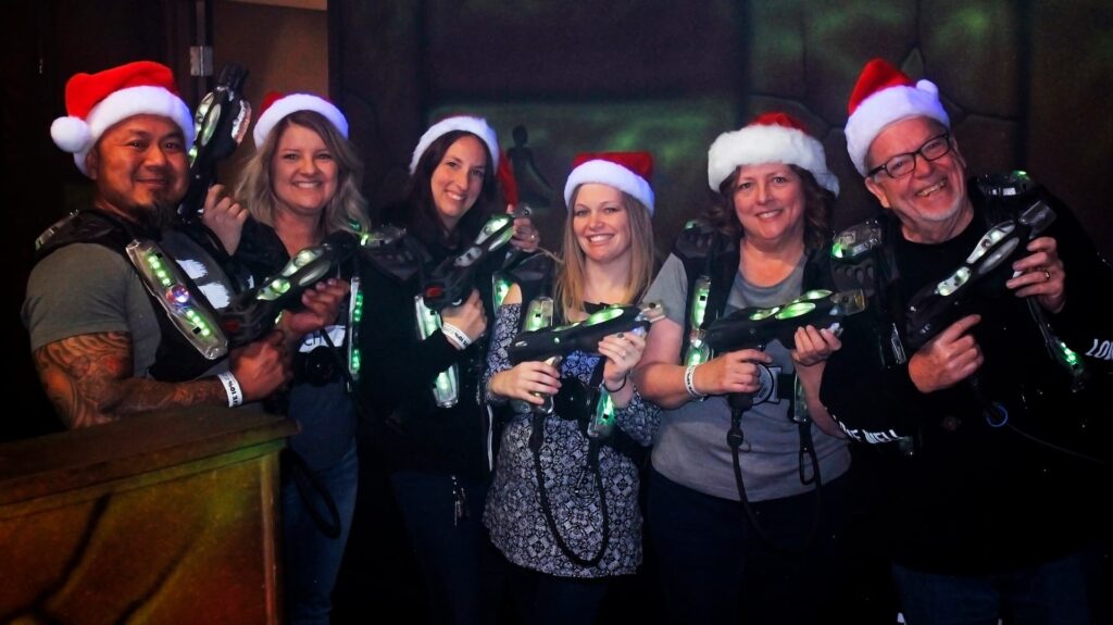 group of works about to play laser tag at edisons